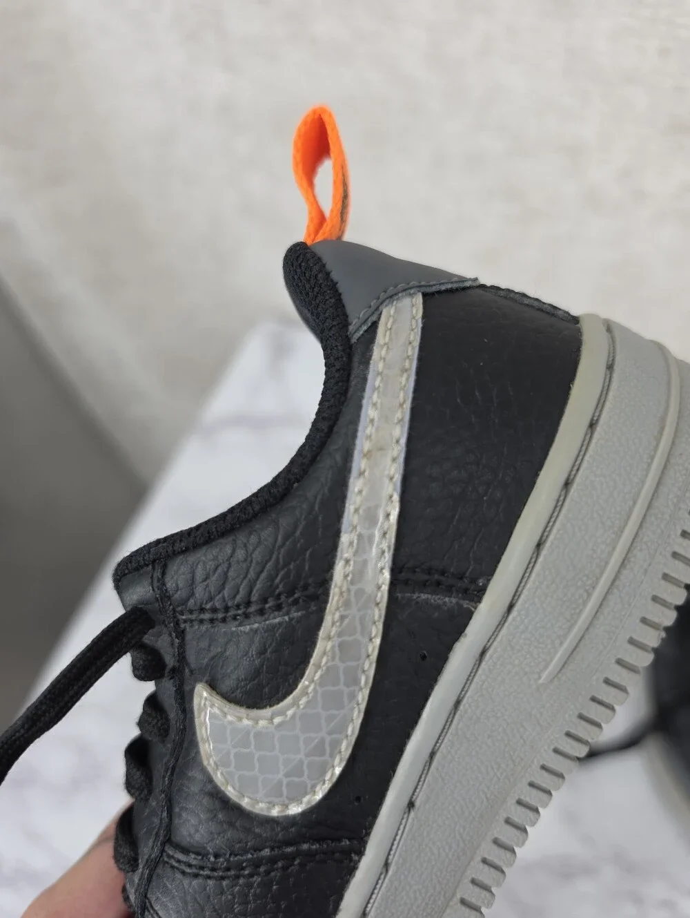 Nike Air Force Lv8 Kids Black & Gray Low-Top Sneakers with Orange Accent